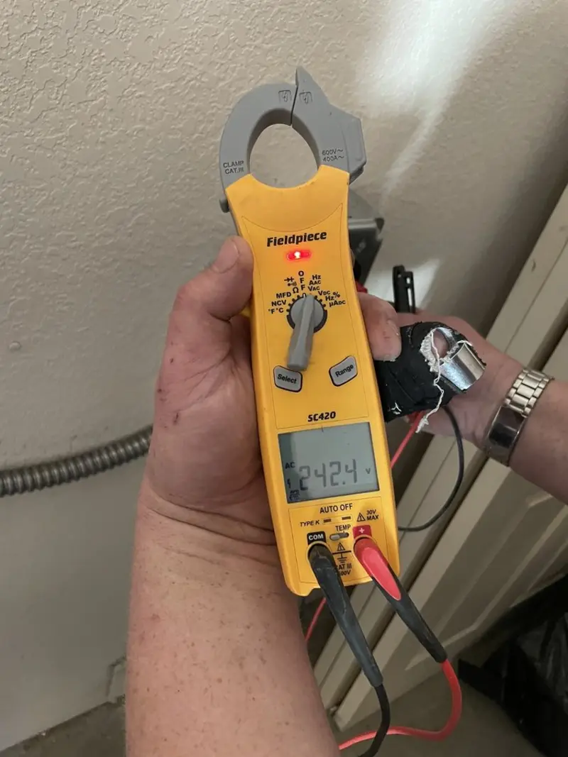 Voltage testing with clamp meter during Hot Tub / Pool Electrical Wiring in Piqua